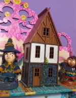 Casa do Mortimer na vida real, uma miniatura feita de MDF e pintada com tinta acrílica.